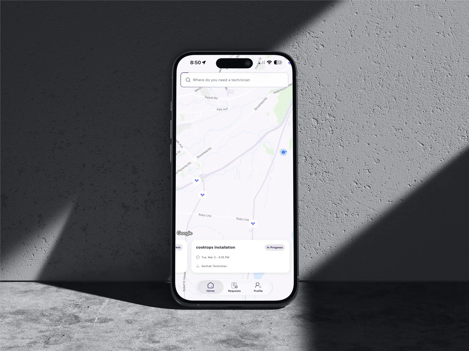 Hariat App job tracking on iPhone, showing a technician route on a map